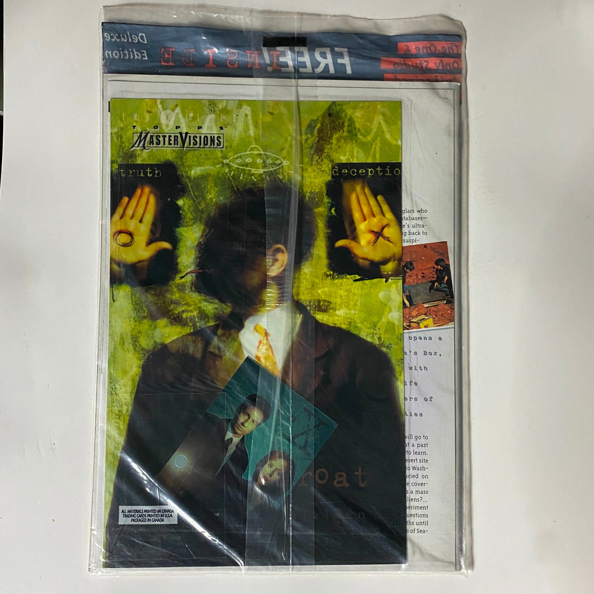 The X Files Magazine Winter 1996 #1 in sealed condition featuring striking visuals and promotional items showcased on the cover.