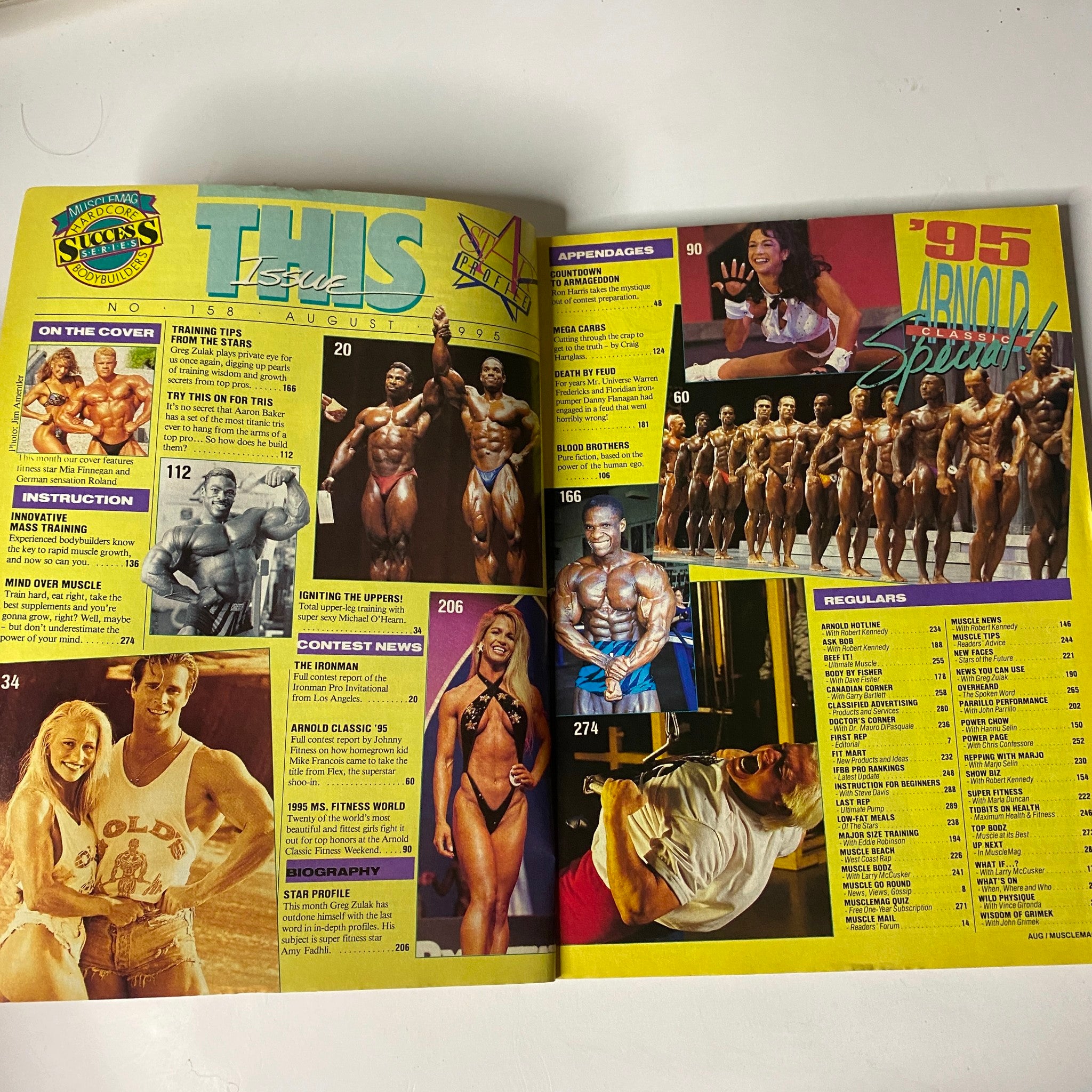 Inside spread of MuscleMag International Magazine August 1995 No. 158 showcasing an Arnold Classic special report, highlights of bodybuilders, and fitness training tips.