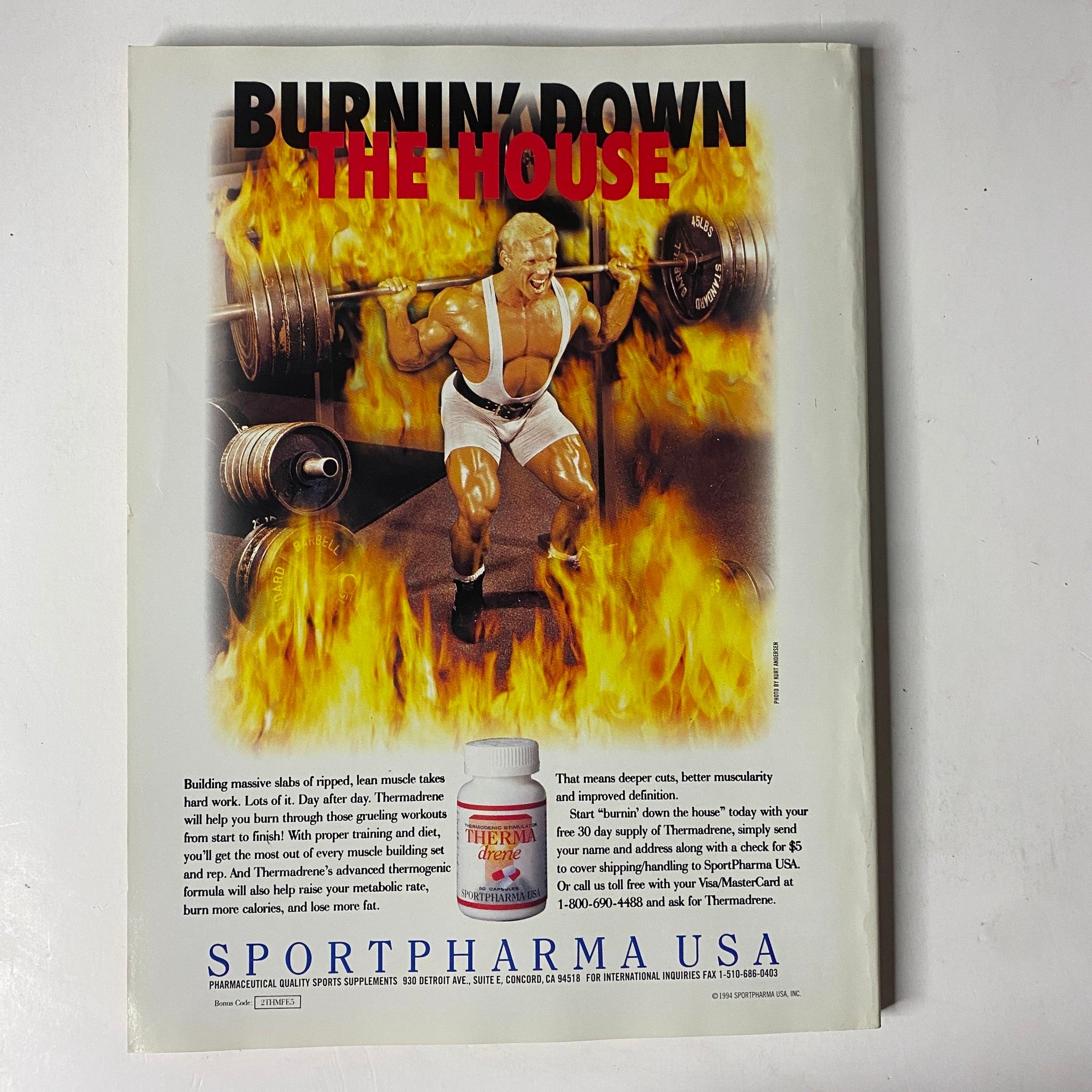 Advertisement on the back cover of MuscleMag International Magazine August 1995 No. 158 for a bodybuilding supplement, featuring a muscular man lifting weights with a fiery background.