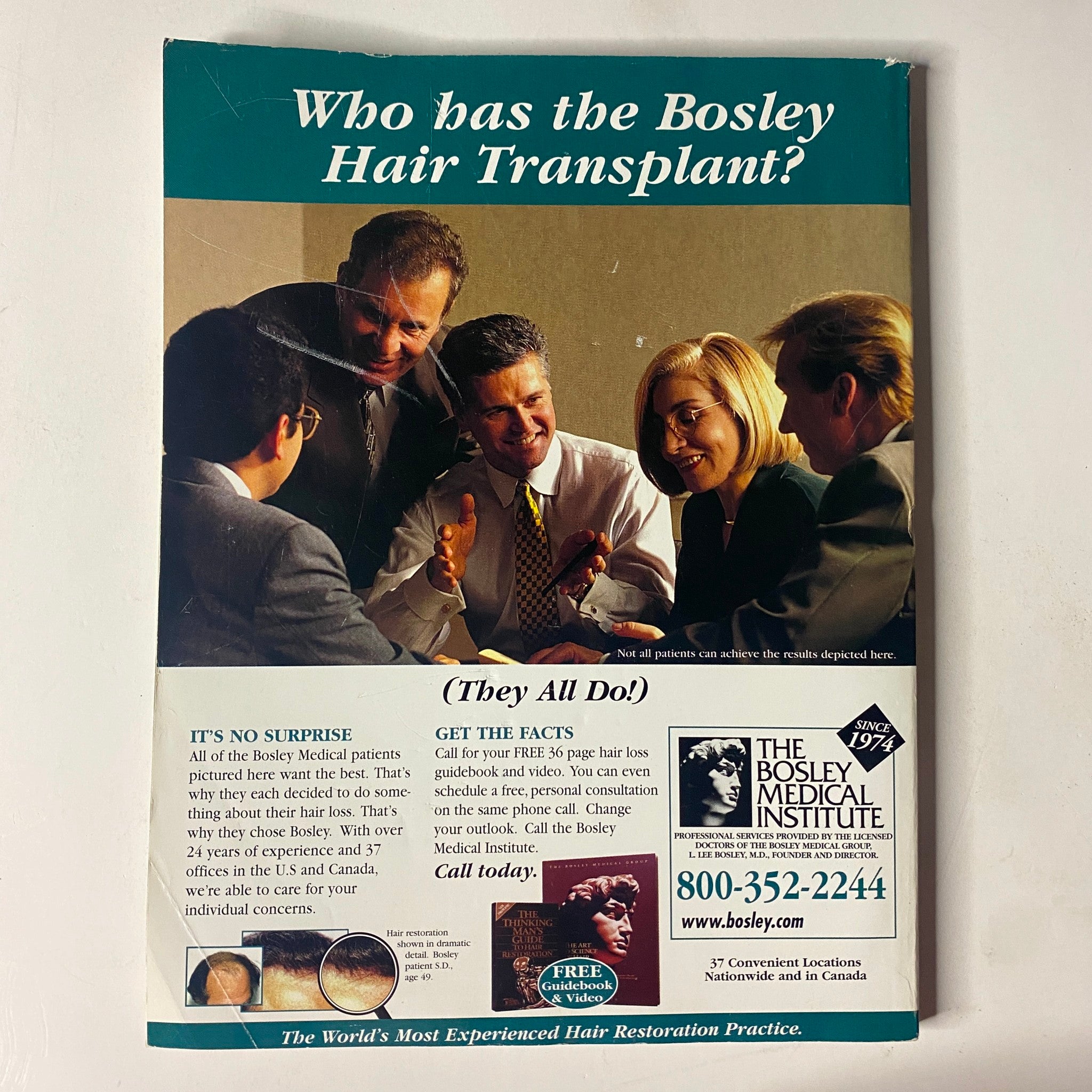 Back cover of Muscle & Fitness Magazine December 1998, advertising Bosley Hair Transplant services, featuring a professional setting with individuals discussing hair loss solutions.