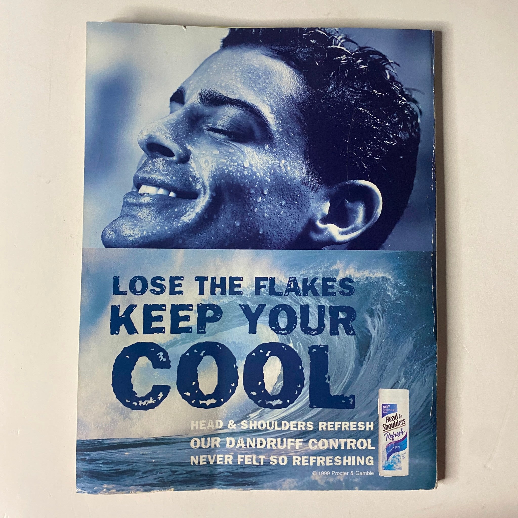 Advertisement from the back cover of Muscle & Fitness Magazine August 1999 promoting Head & Shoulders, emphasizing fresh and dandruff-free hair.