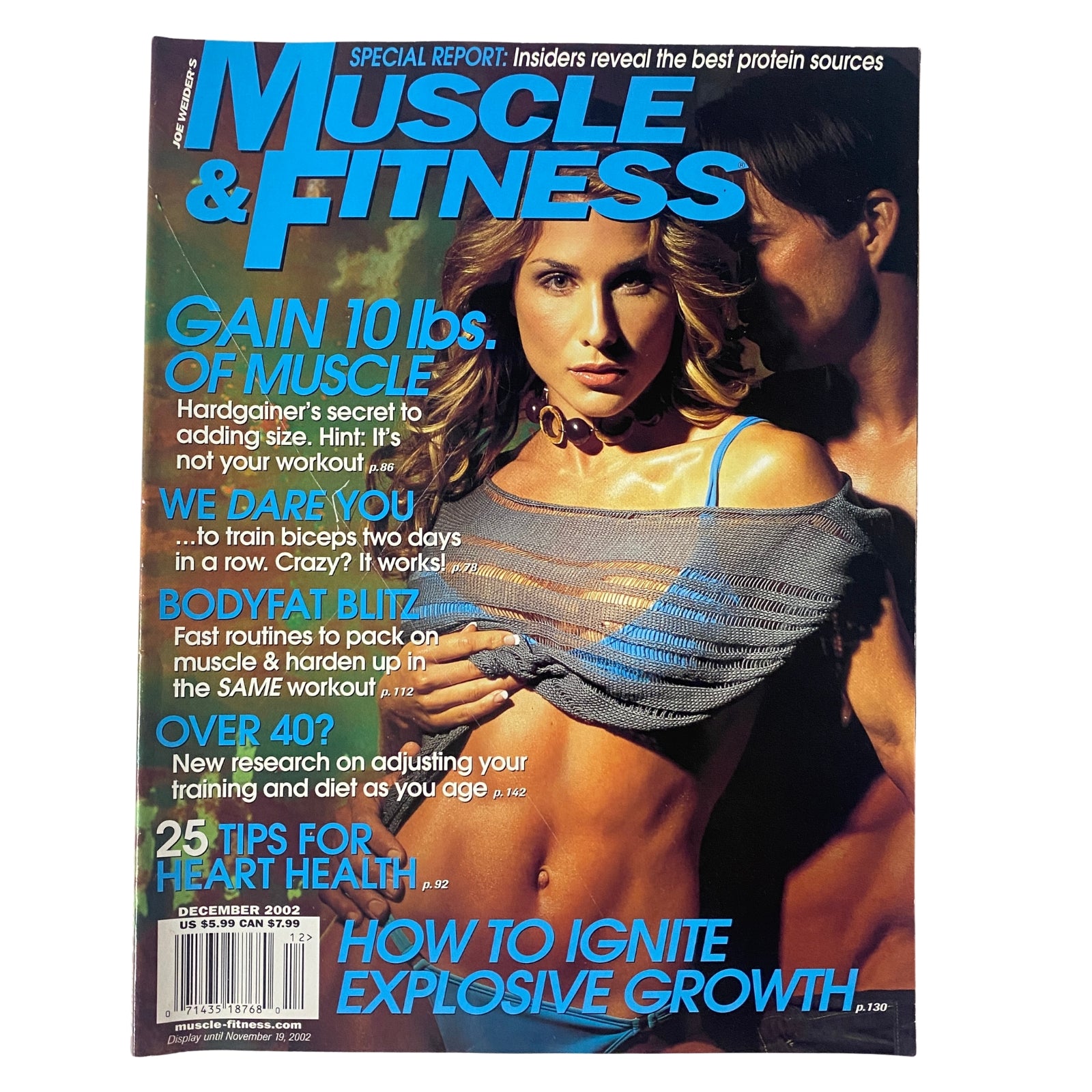 Muscle & Fitness Magazine December 2002 Vol 63 No. 12 cover featuring a male and female model, highlighting muscle gains, workout tips, and fitness advice.