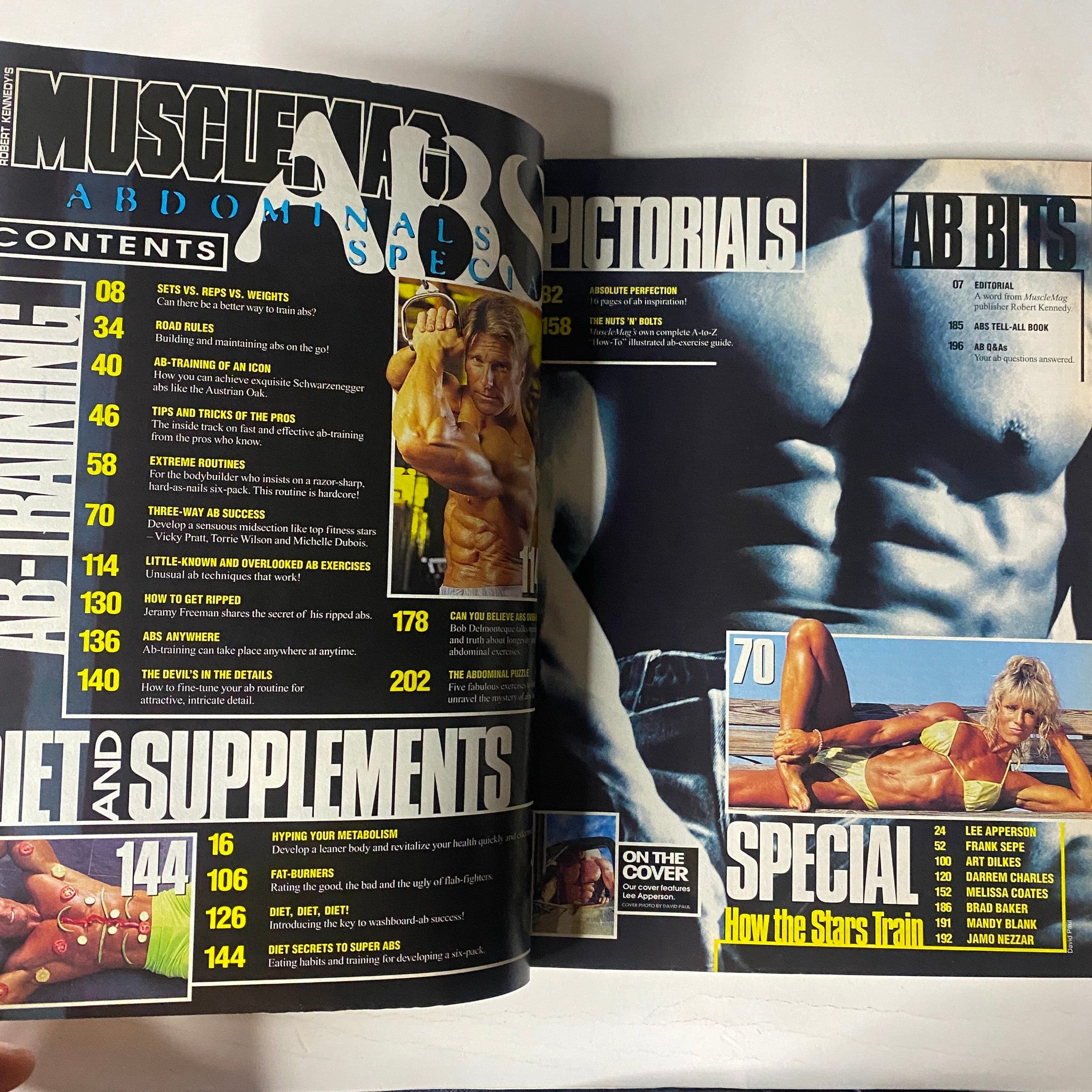 Inside spread of MuscleMag International Spring 2000 Collector's Issue: Abdominals, displaying the table of contents with articles on ab training techniques and fitness supplements.