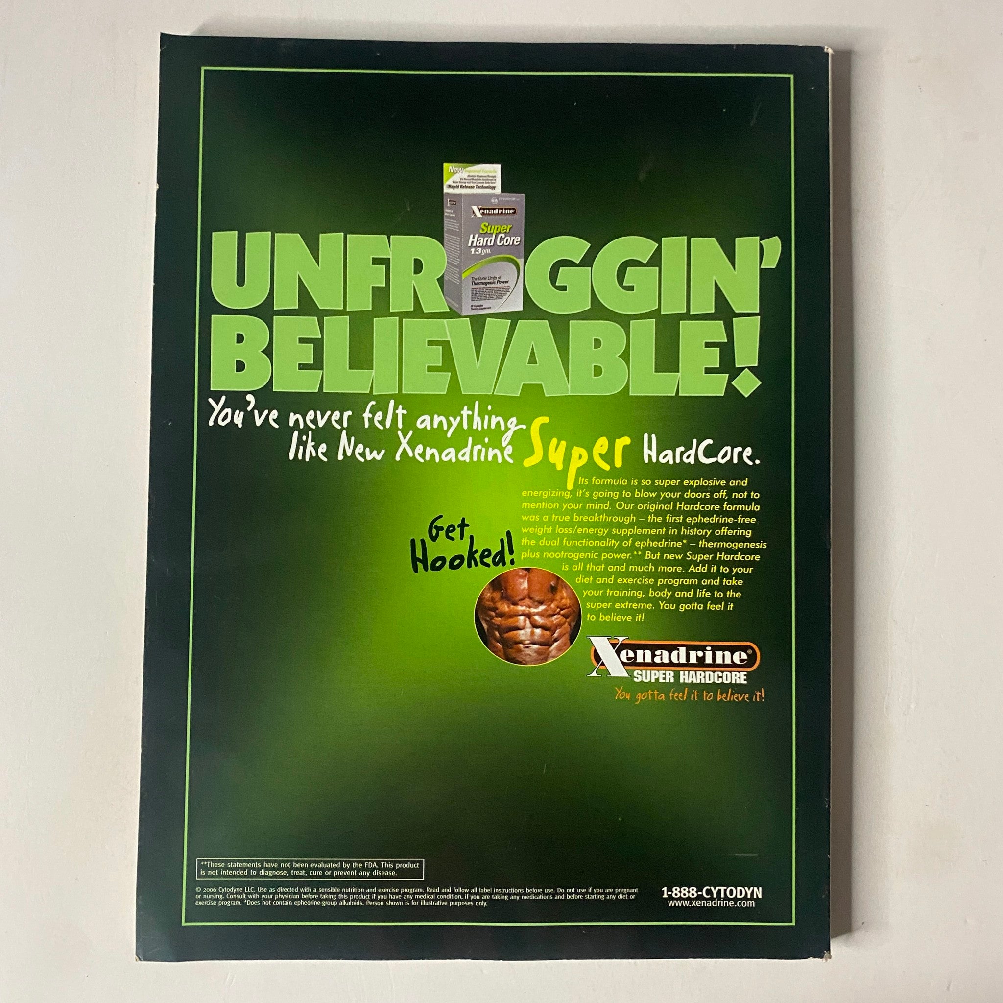 Back cover of MuscleMag International Magazine November 2006 No. 294, promoting Xenadrine Super HardCore with a bold green design and fitness message, emphasizing its effectiveness.