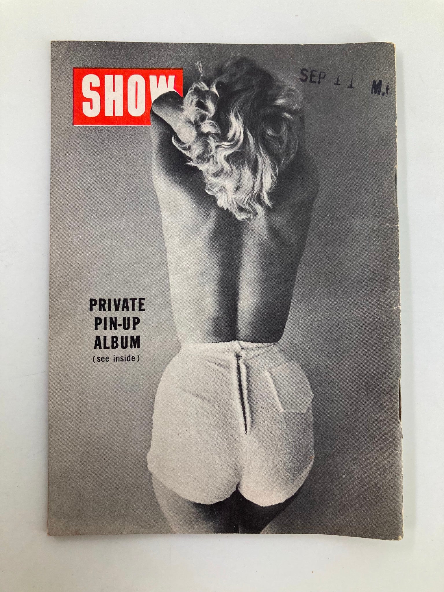 Another cover of VTG Show Magazine showcasing a model from the back in a retro outfit, emphasizing the vintage pin-up style while promoting 'Private Pin-Up Album' content inside.
