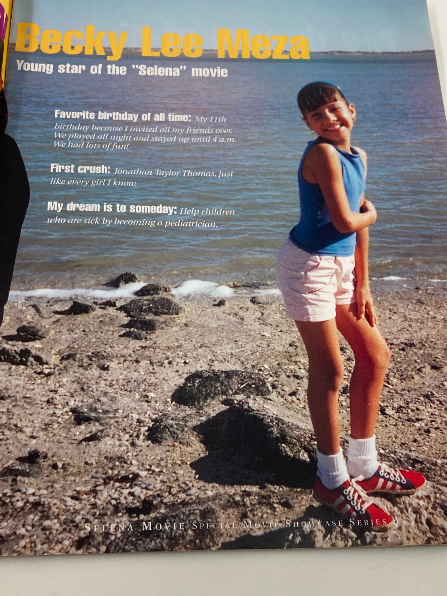 1997 Selena Movie Special Movie Showcase Series feat. Becky Lee Meza. Image of Becky Lee Meza, young star of the 'Selena' movie, standing by the water, sharing her favorite birthday memory and dream of helping children.