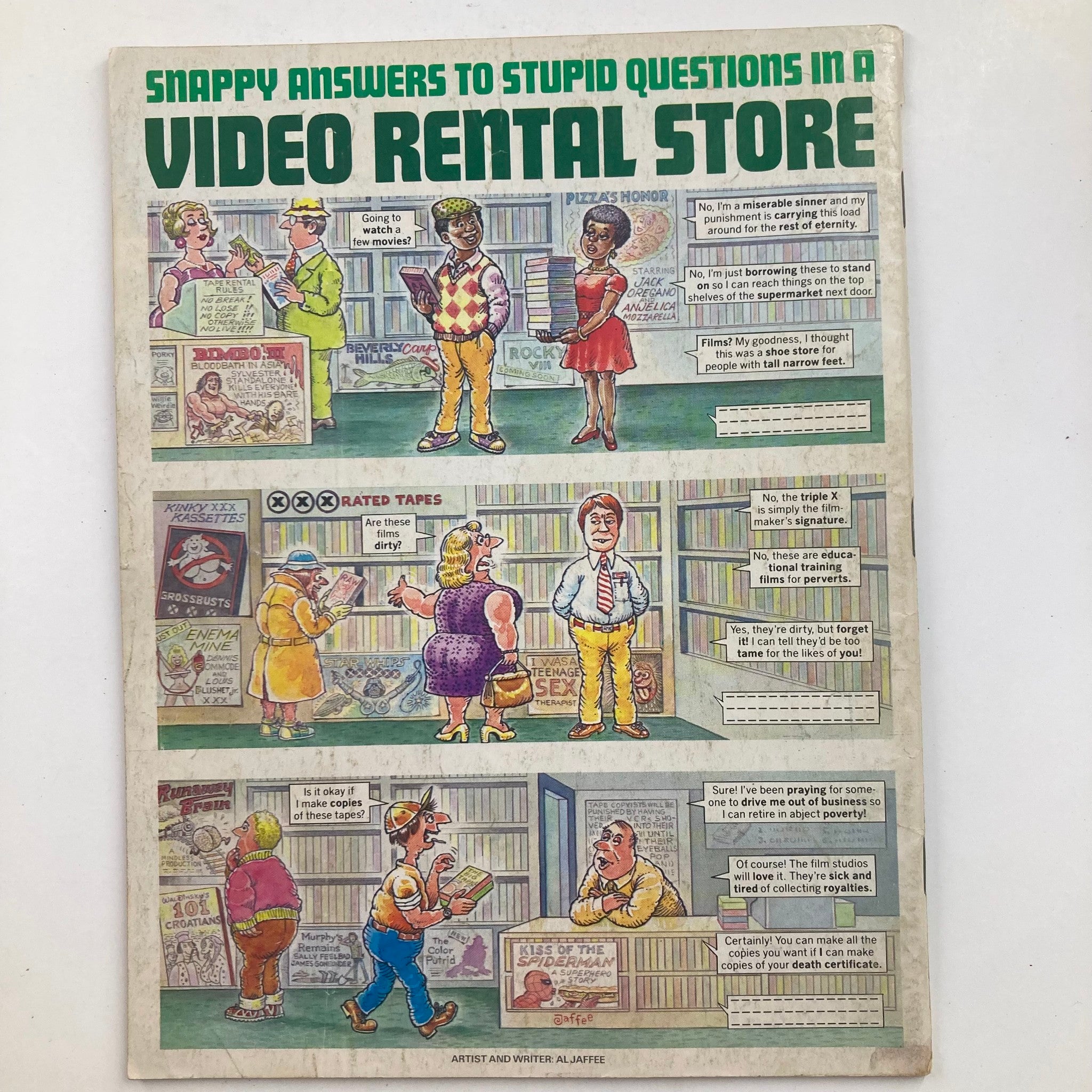 Back cover of Mad Magazine July 1986 No. 264 with a comic strip titled 'Snappy Answers to Stupid Questions in a Video Rental Store,' emphasizing the humor style of the publication.