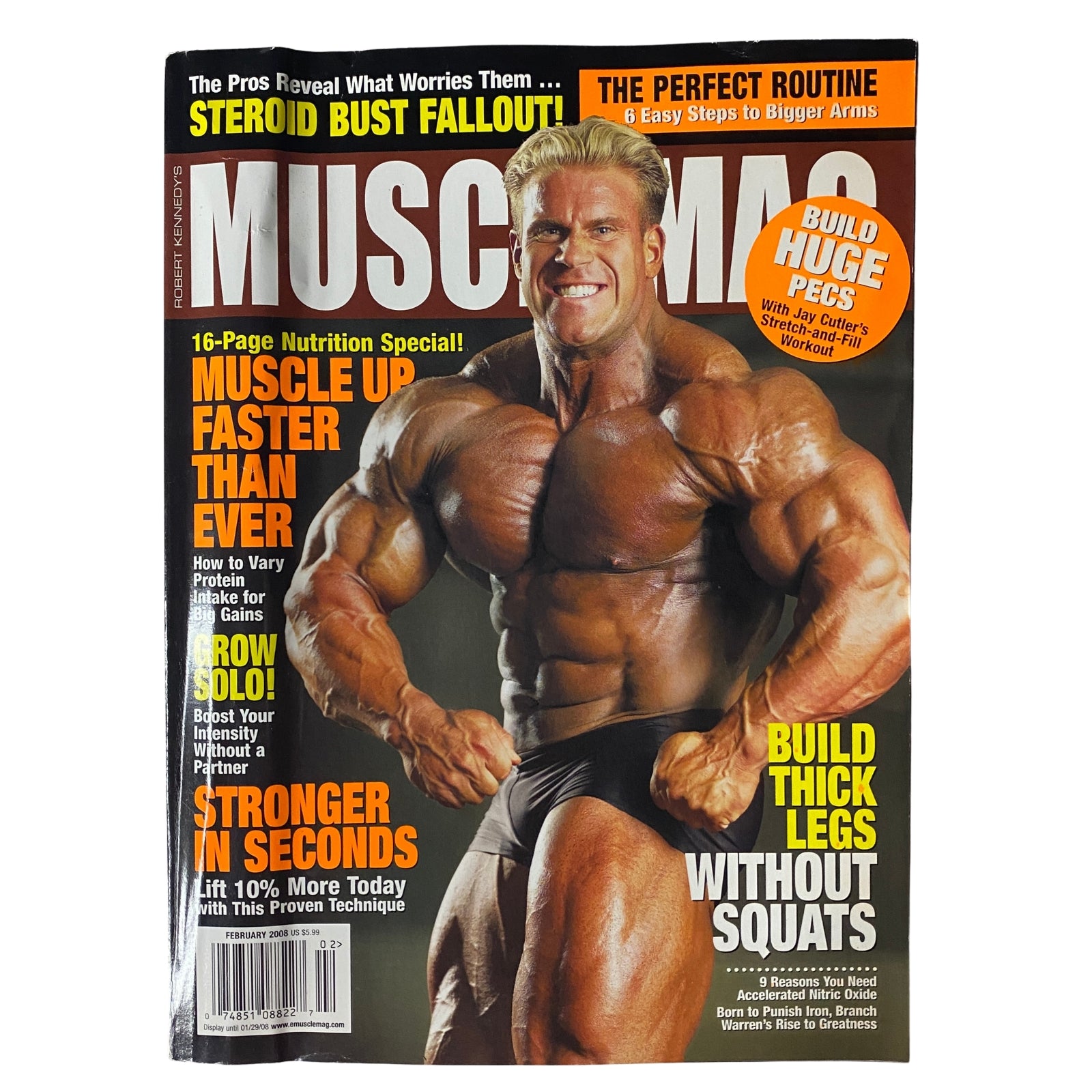 Cover of MuscleMag International Magazine February 2008 No. 309 featuring a muscular bodybuilder showcasing strength. The magazine discusses topics related to bodybuilding and fitness.