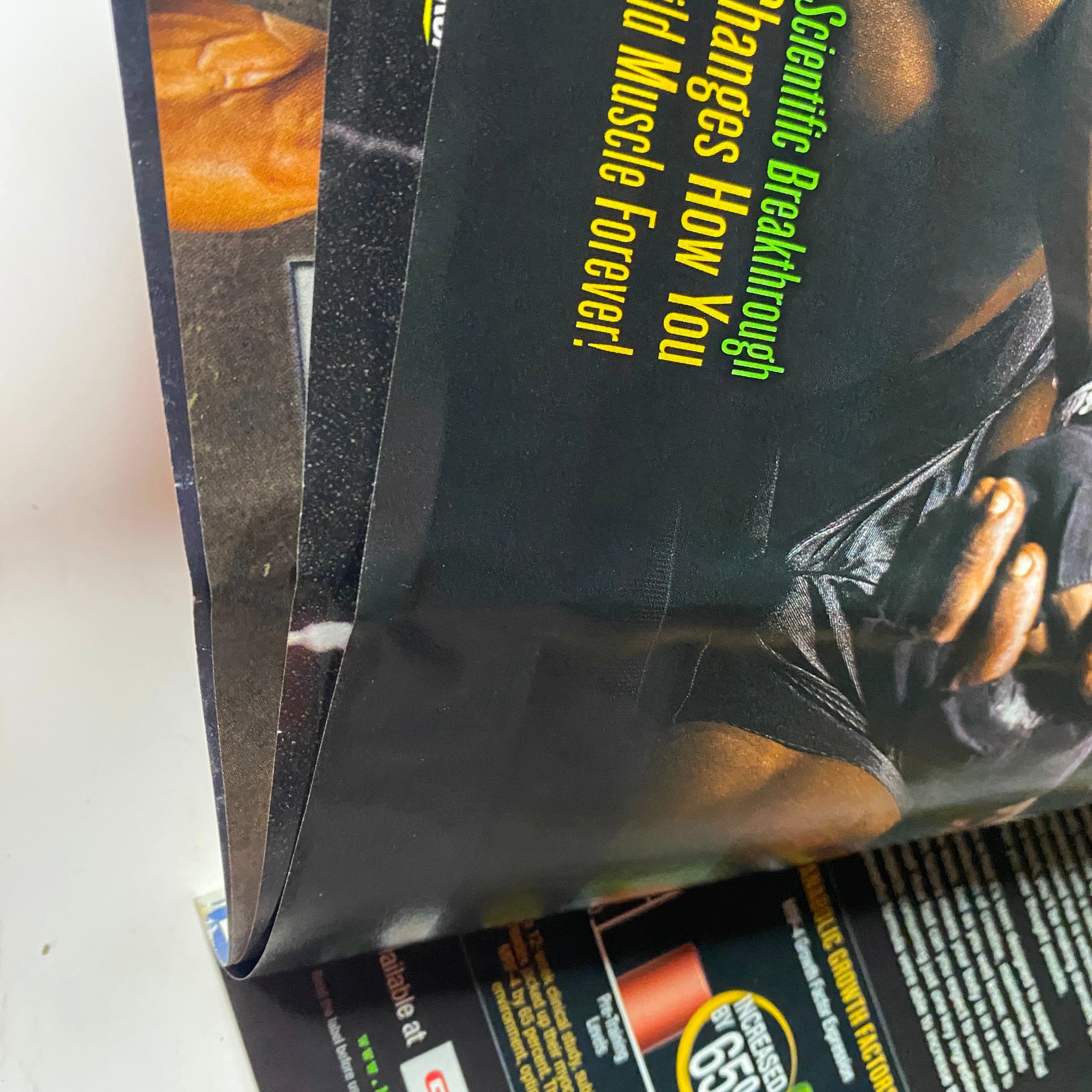 MuscleMag International Magazine August 2008 #315 featuring a page with a scientific breakthrough advertisement, illustrating muscle enhancement.