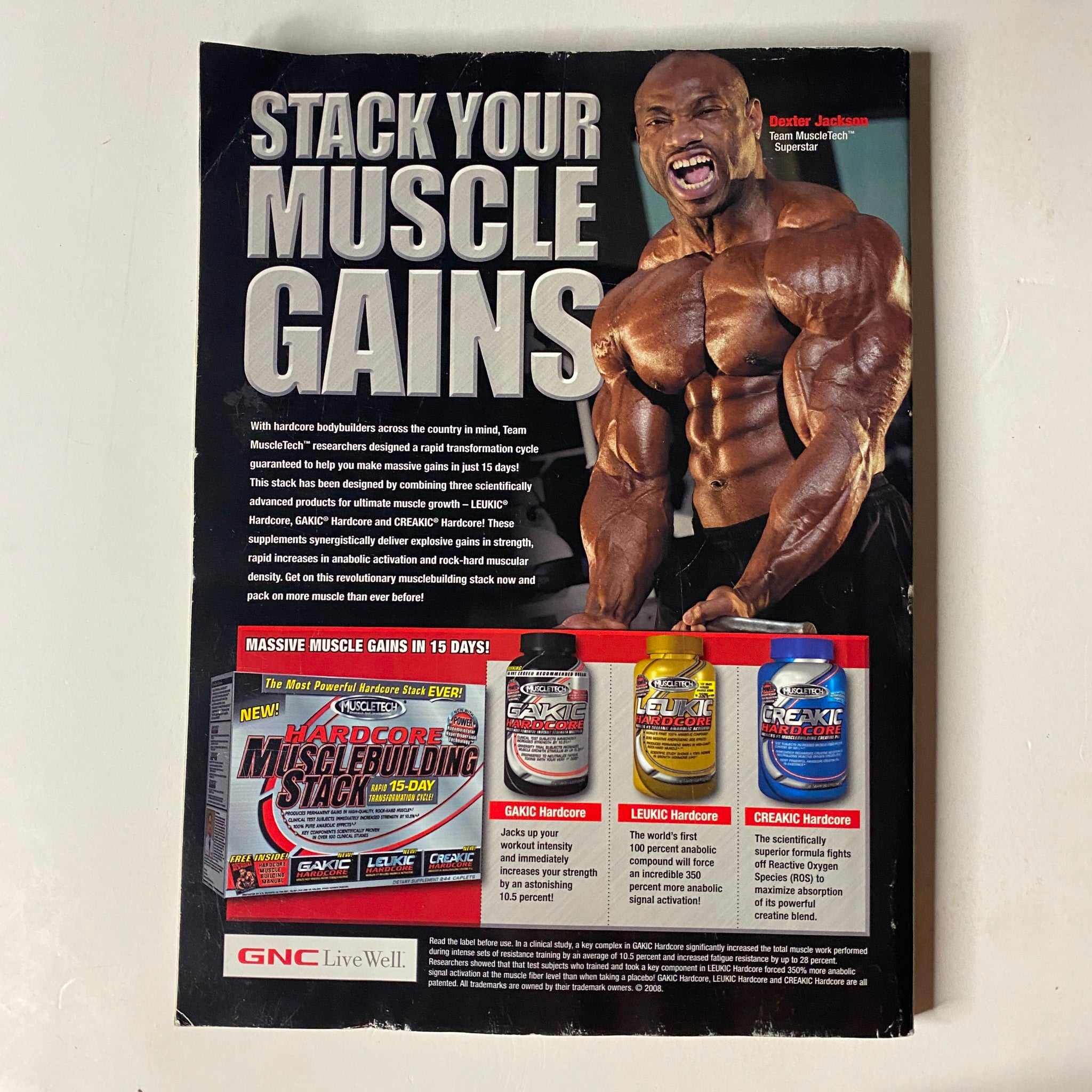Promotional page in MuscleMag International Magazine October 2008 No. 317 featuring professional bodybuilder Dexter Jackson advertising muscle gain products for fitness enthusiasts.