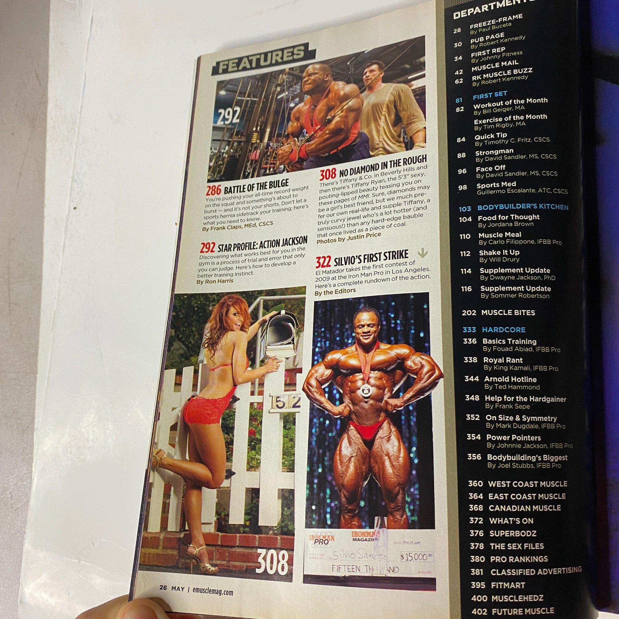 Features page from MuscleMag International Magazine May 2009 #324 showcasing articles on bodybuilders like Silvio and Star Profile: Action Jackson. Highlights vintage fitness content.
