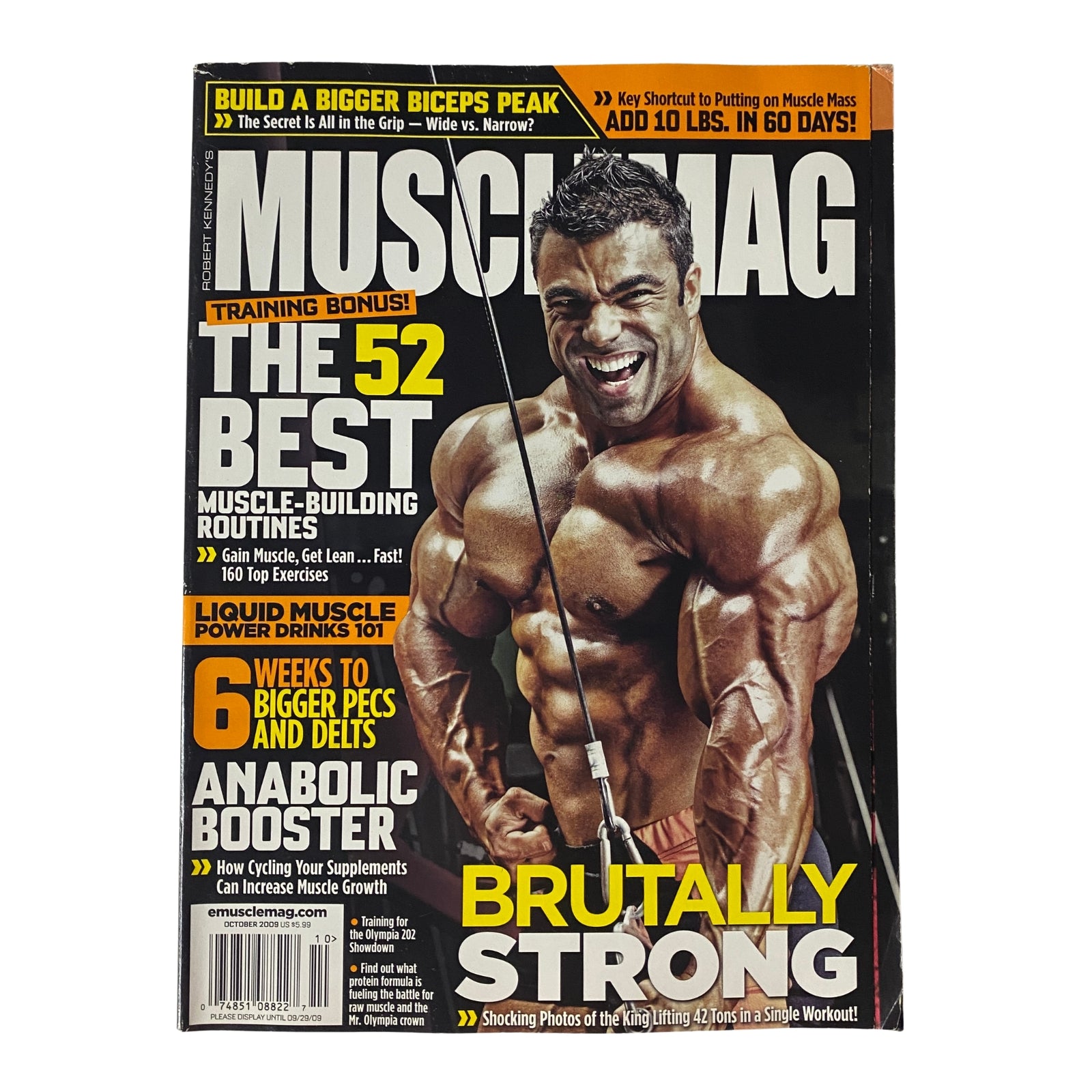 Cover of MuscleMag International Magazine October 2009 #329 featuring Eduardo Correa, showcasing muscle-building routines and workout strategies.