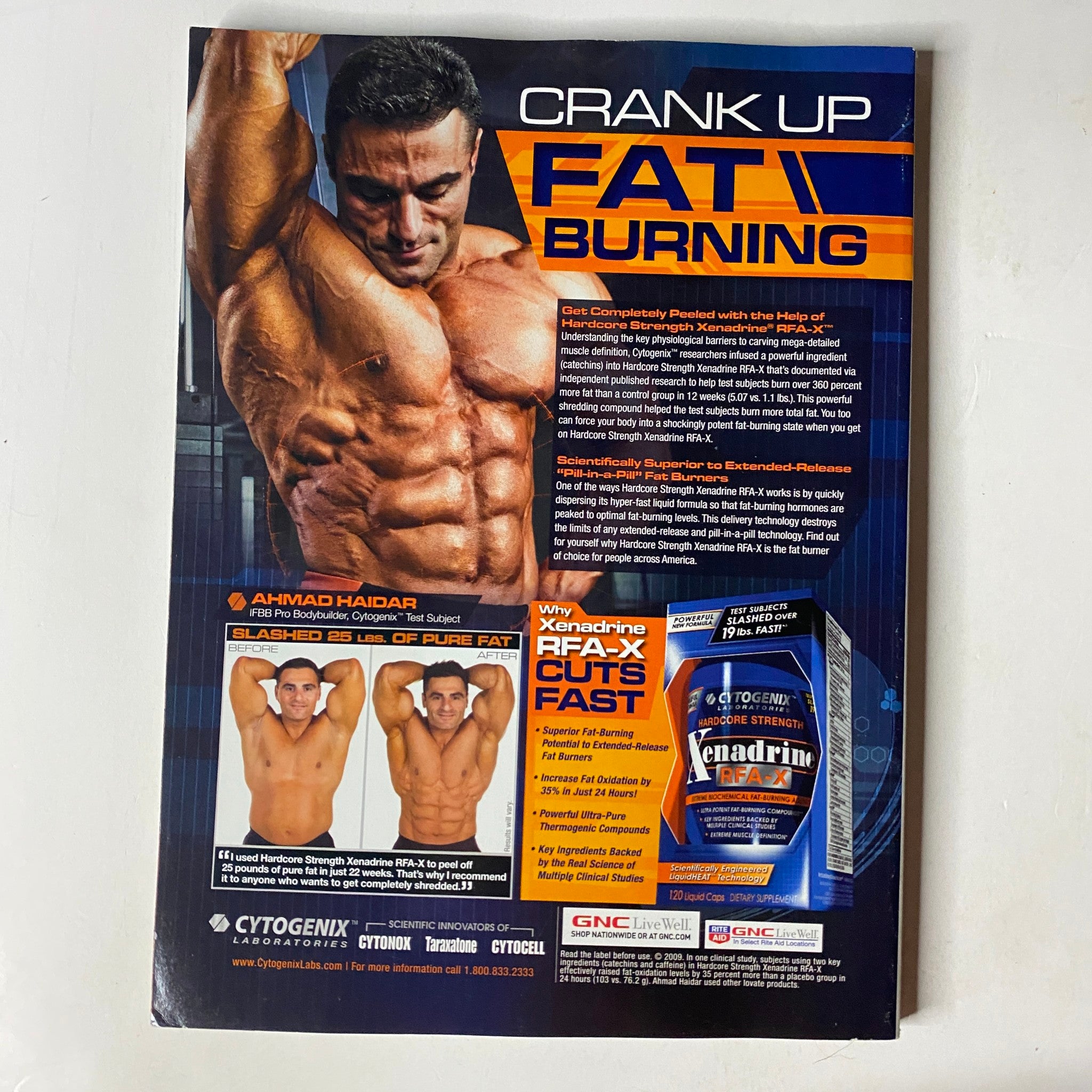 MuscleMag International Magazine December 2009 No. 331 featuring Michele Levesque on the cover, showcasing a fitness advertisement highlighting 'Crank Up Fat Burning' with images of bodybuilder Ahmad Haidar and product details for Cytogenix supplements.