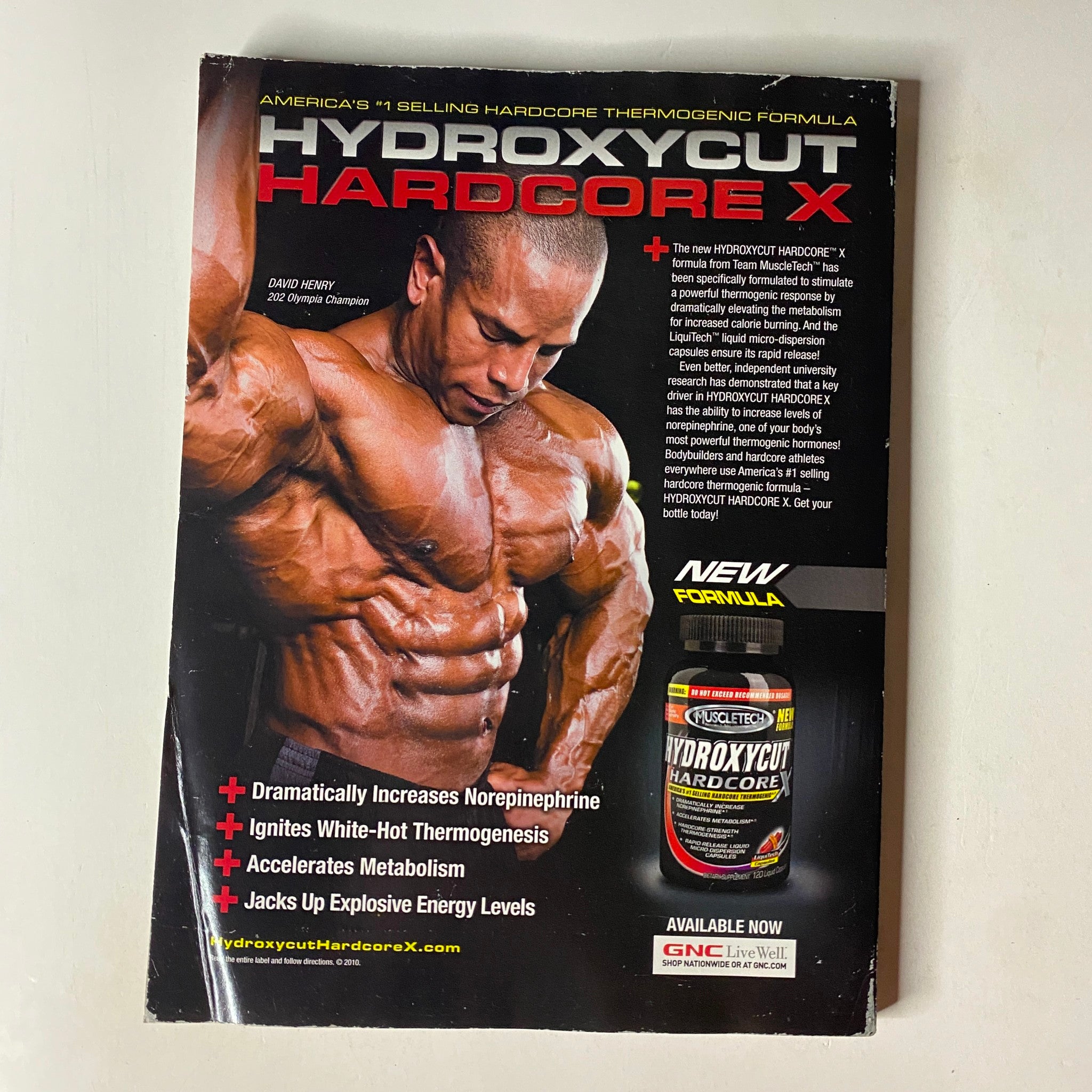 Back cover of MuscleMag International Magazine May 2010, featuring Hydroxycut Hardcore X advertisement, promoting energy and metabolism enhancement.