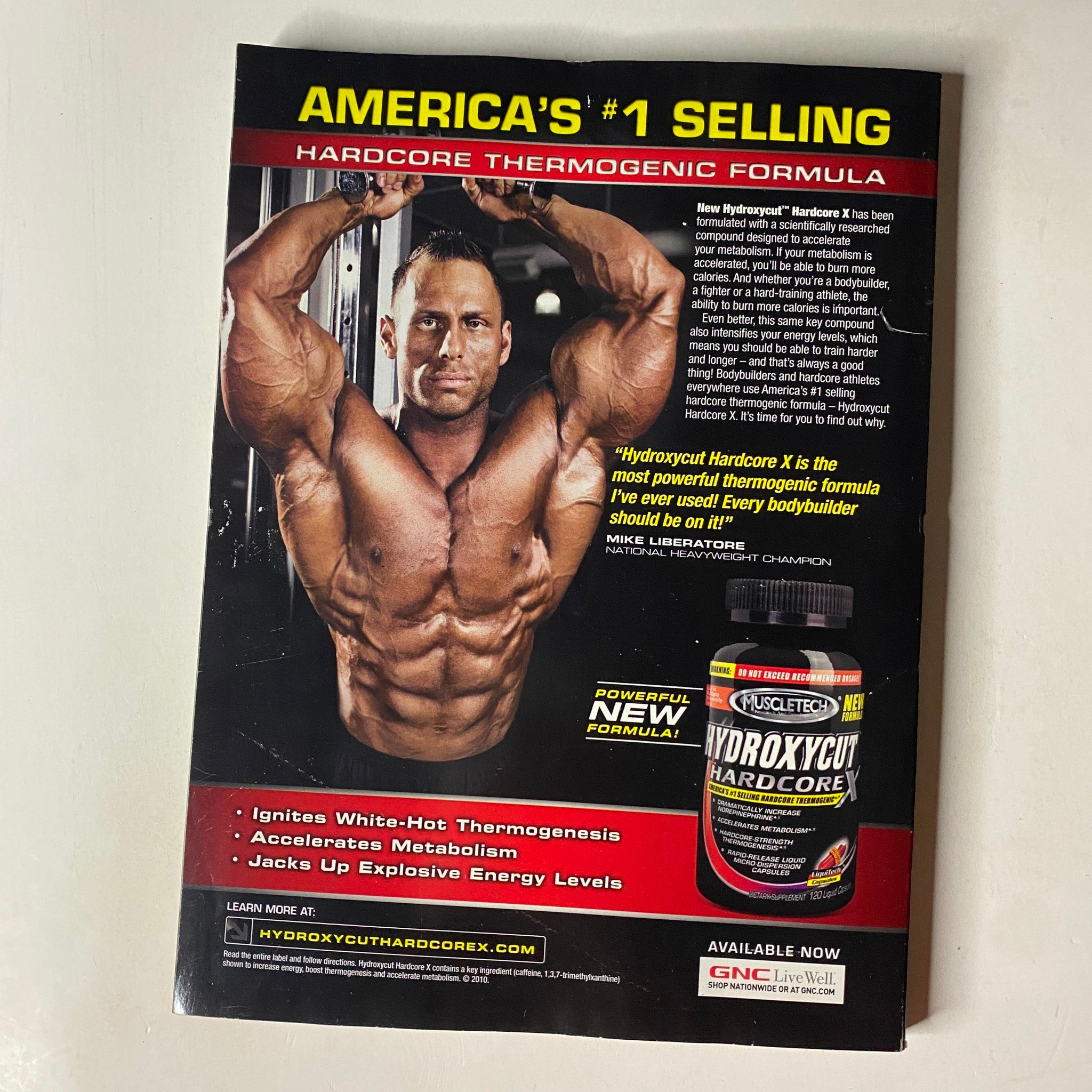 Back cover of MuscleMag International Magazine June 2010 #337 advertising Hydroxycut Hardcore X, a thermogenic supplement designed for bodybuilding, featuring testimonials from a champion.