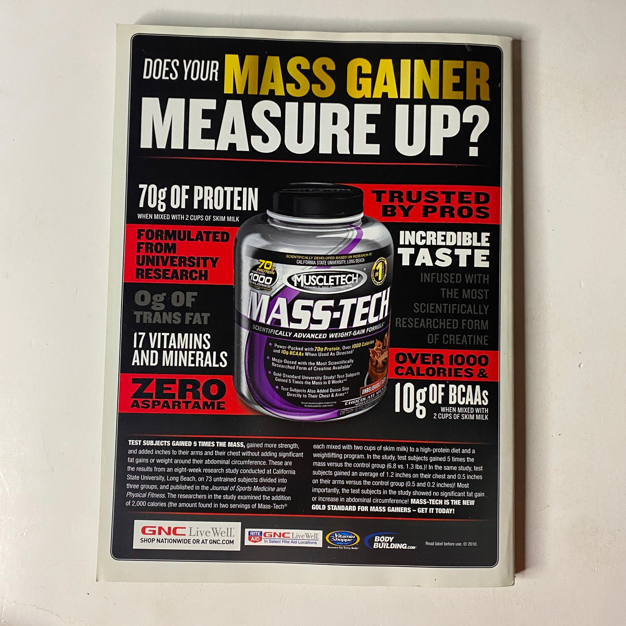 Advertisement for MuscleTech Mass Gainer featuring detailed nutritional information in MuscleMag International Magazine January 2011, No. 344.