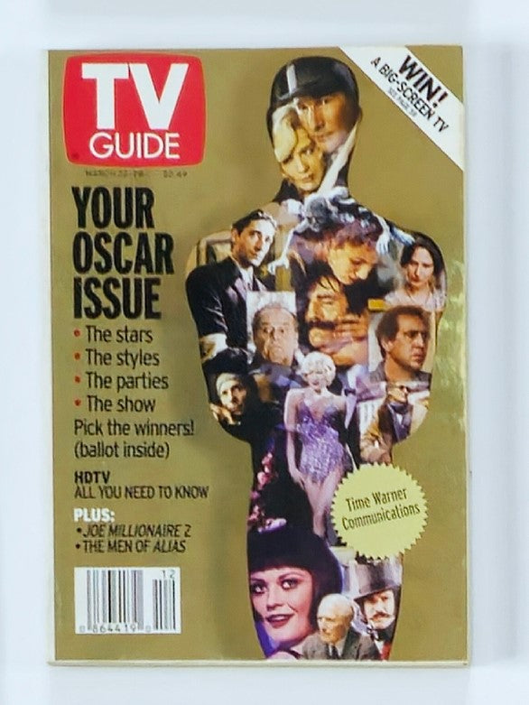 TV Guide Magazine March 22 2003 featuring 'The Men of Alias' on the cover, showcasing a collage of iconic characters and actors from the show, highlighting its impact on early 2000s television.