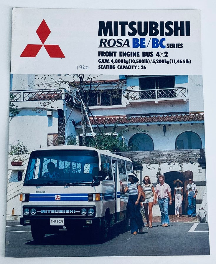 1980 Mitsubishi Rosa BE/BC Series Dealer Showroom Sales Brochure featuring a front engine bus parked outside with passengers. The brochure includes specifications such as seating capacity of 26 and gross vehicle weight. Perfect for collectors and enthusiasts of vintage automotive literature.