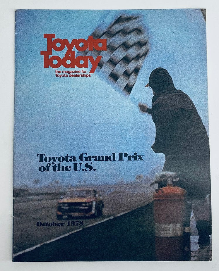 Cover of the VTG Toyota Today Magazine from October 1987 featuring the Toyota Grand Prix of the U.S., showcasing a scene with a checkered flag and a race car in the background, highlighting Toyota's racing legacy.