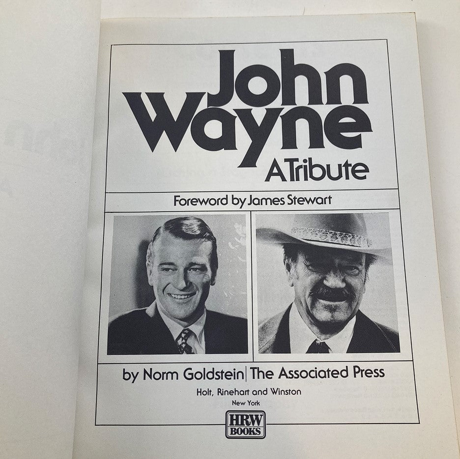 Inside page of VTG 1979 John Wayne A Tribute by Norm Goldstein - The Associated Press displaying John Wayne alongside James Stewart.