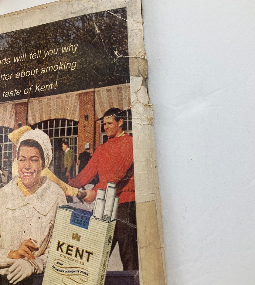 Back cover of Playboy Magazine March 1962 featuring an advertisement for Kent Cigarettes with a vintage design.