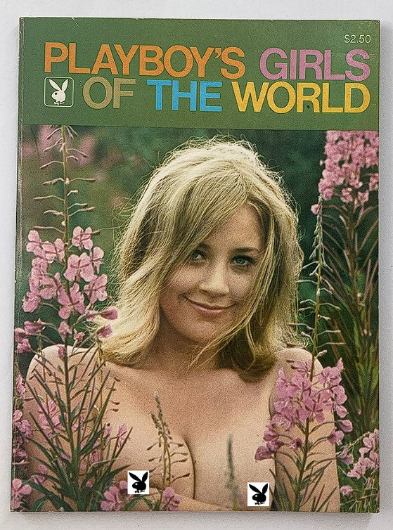 Vintage 1971 Playboy's Girls of the World magazine cover featuring a woman smiling among flowers, showcasing a celebration of beauty and cultural diversity.