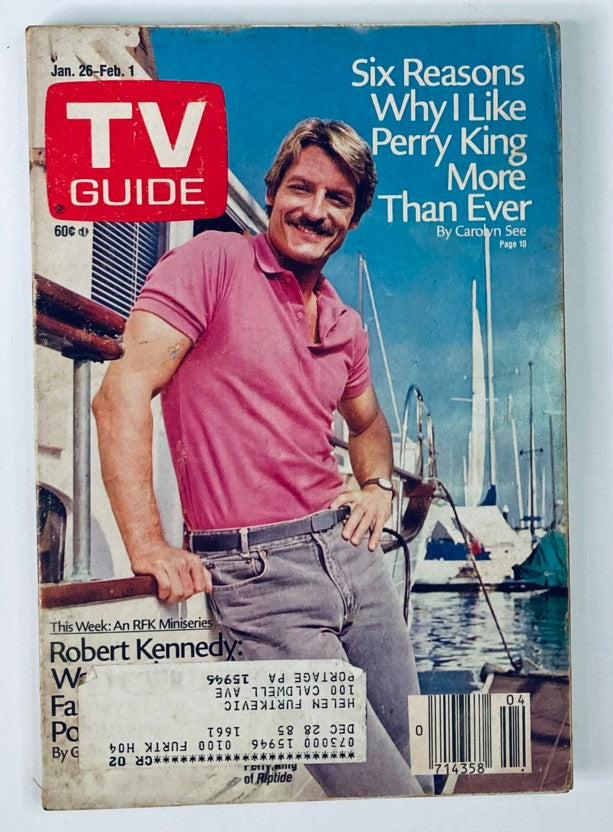 TV Guide Magazine cover from January 26, 1985 featuring Perry King. The magazine highlights 'Six Reasons Why I Like Perry King More Than Ever' by Carolyn See. A vintage item showcasing the charming actor against a backdrop of boats, capturing the essence of 1980s television culture.